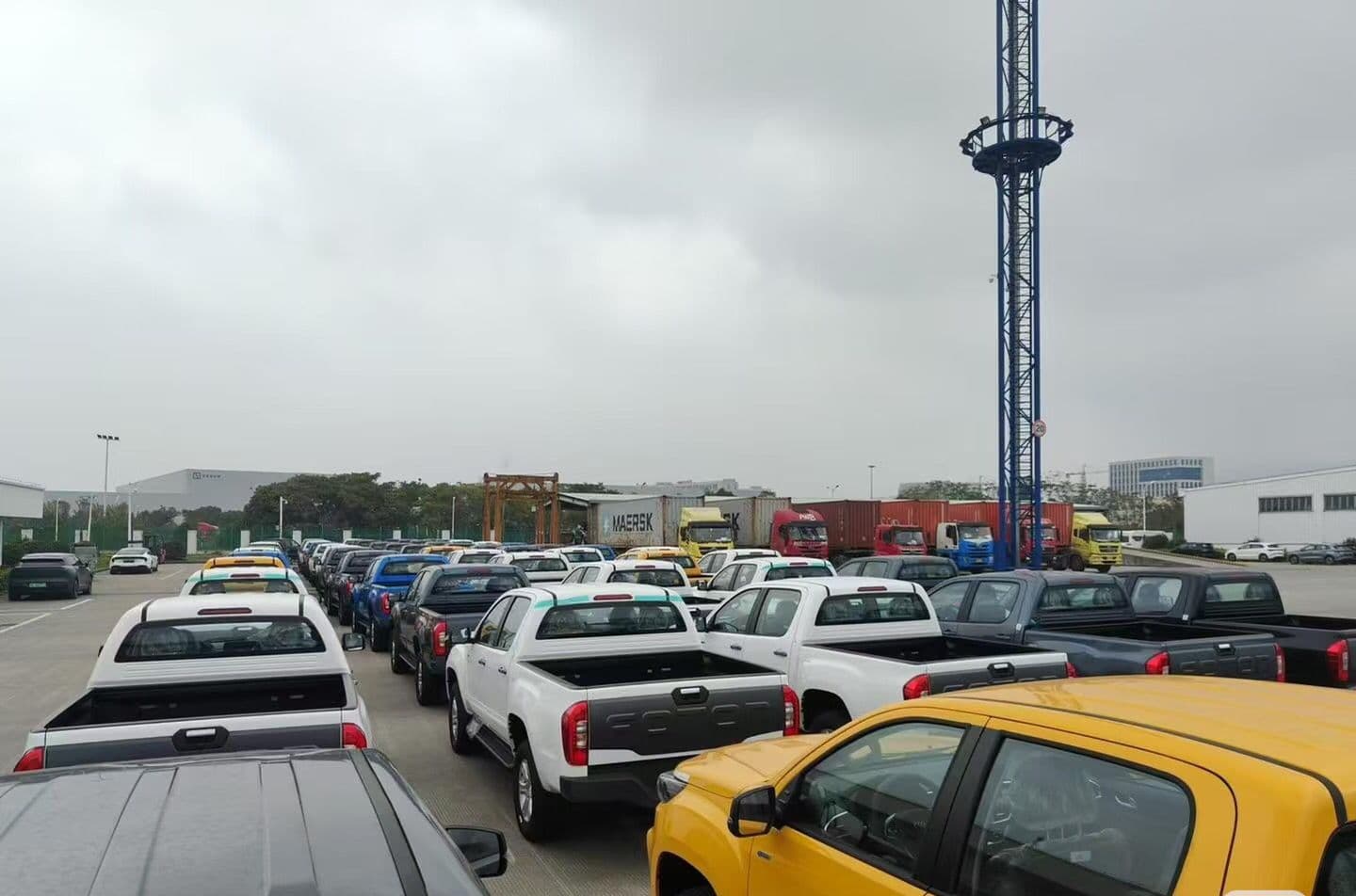 Vehicles waiting at an export yard in China before shipment